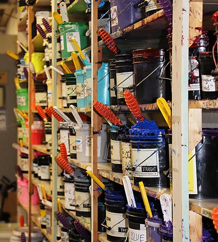 Ink buckets on wall